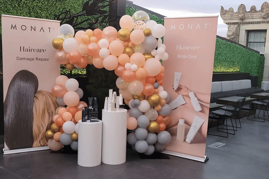 A table with balloons and bottles of lotion